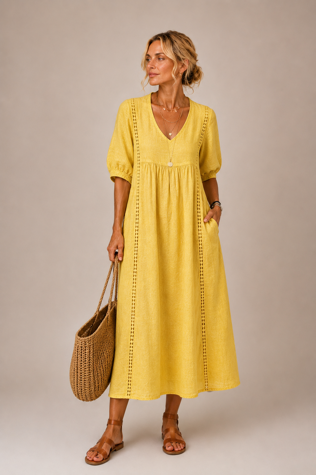 Vestido midi de verano amarillo con escote en V y mangas abullonadas, bordado vertical.
