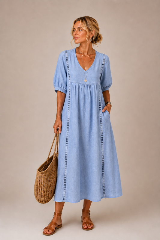 Vestido midi celeste de verano con escote en V y mangas abullonadas, costura vertical.