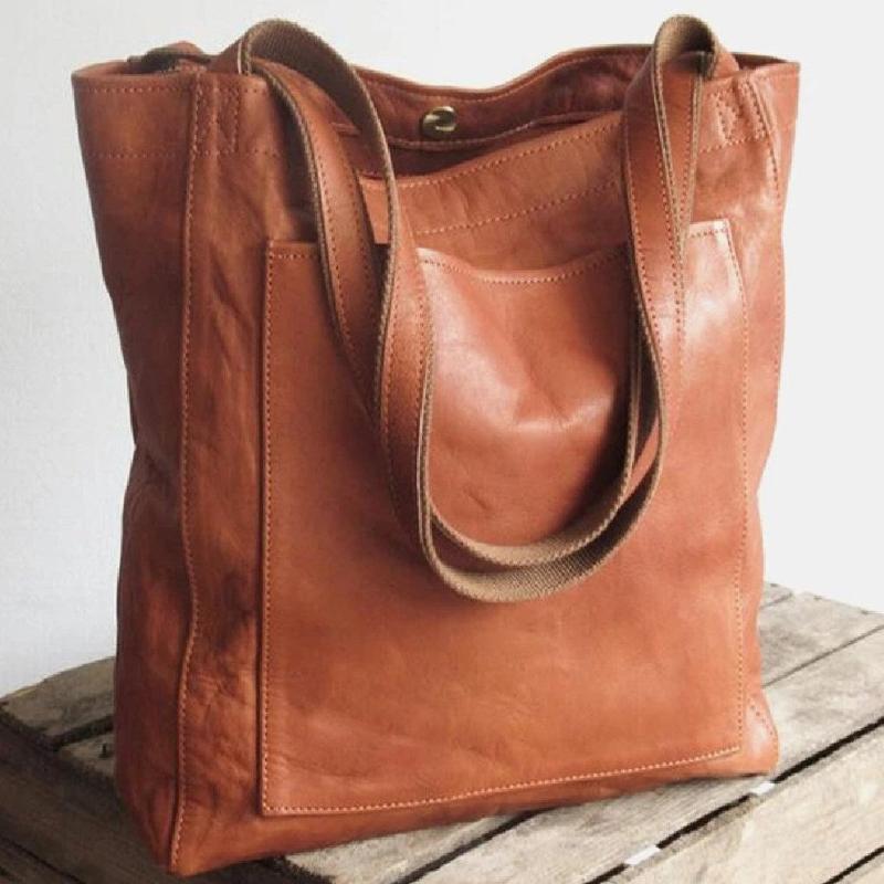 Bolso clásico Kimberly™ de cuero marrón, asas tipo bandolera y compartimento superior con cierre