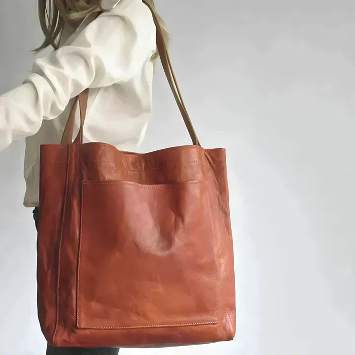 Bolso clásico Kimberly™ de cuero marrón, asa superior y bolsillo frontal con tapa