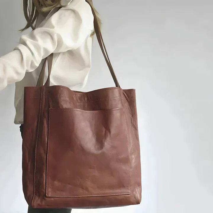 Bolso clásico Kimberly™ de cuero marrón con asa larga y bolsillo frontal acolchado