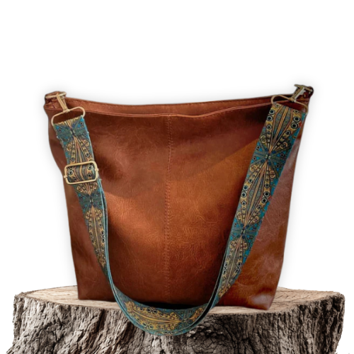 Bolso bandolera vintage marrón con correa estampada turquesa y hebillas doradas