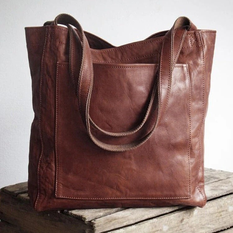 Bolso clásico Kimberly™ de cuero marrón oscuro con asas dobles y bolsillo frontal