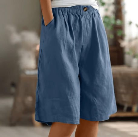 Pantalón corto de algodón azul, cintura elástica con botón, corte recto y bolsillos