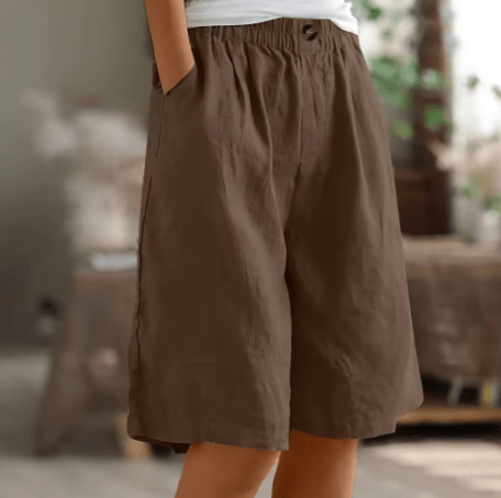 Pantalones cortos de algodón marrones con cintura elástica y botón frontal