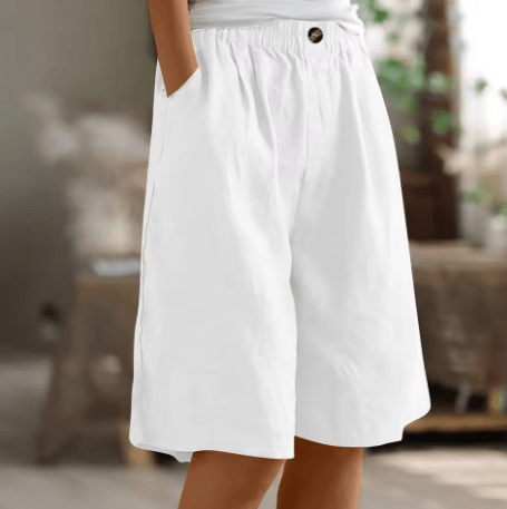 Pantalones cortos de algodón blancos con cintura elástica y botón frontal