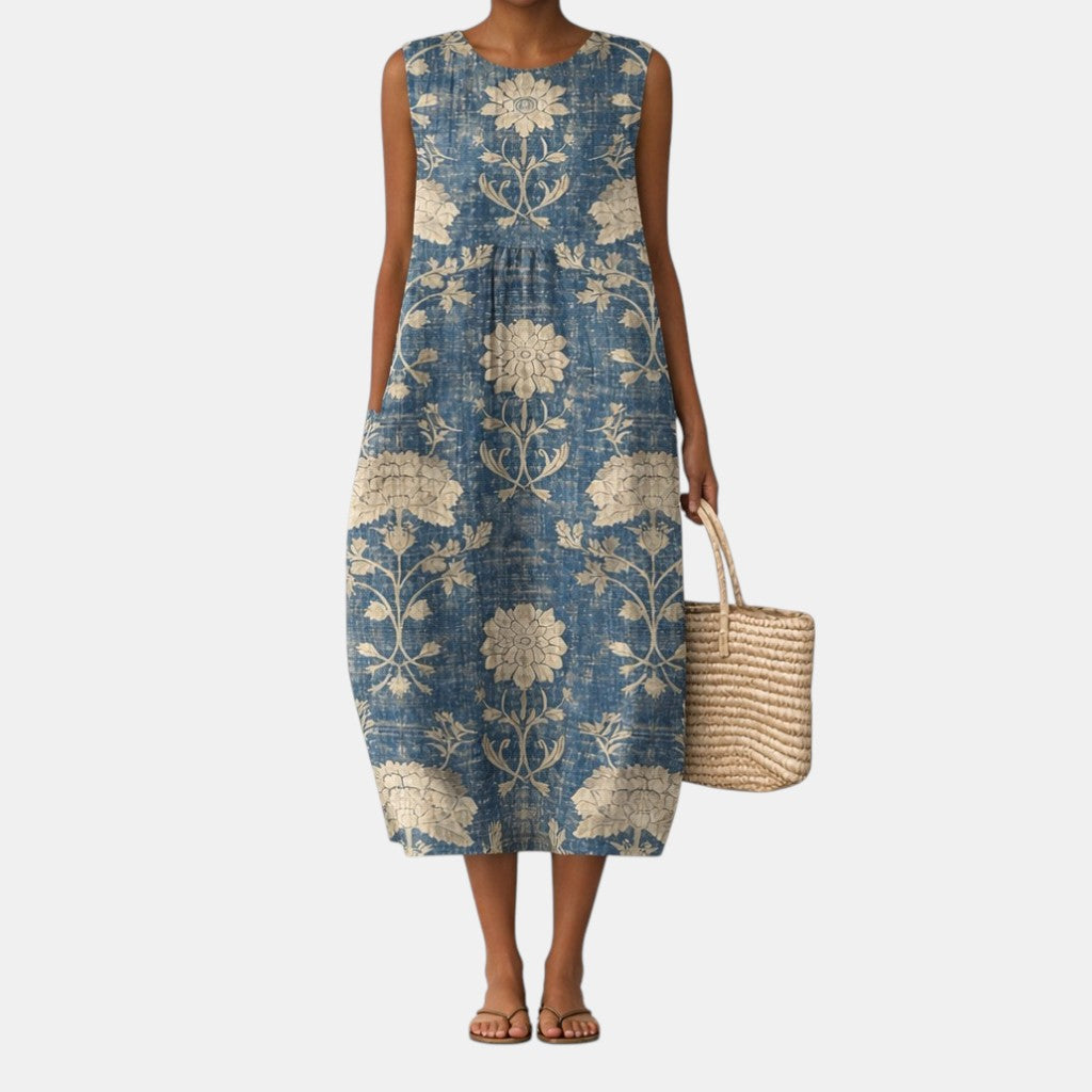 Vestido midi sin mangas estampado floral azul y beige, hasta la media pantorrilla