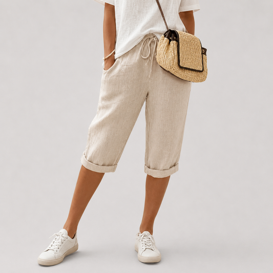 Cortos beige con cordón y puños, tiro medio