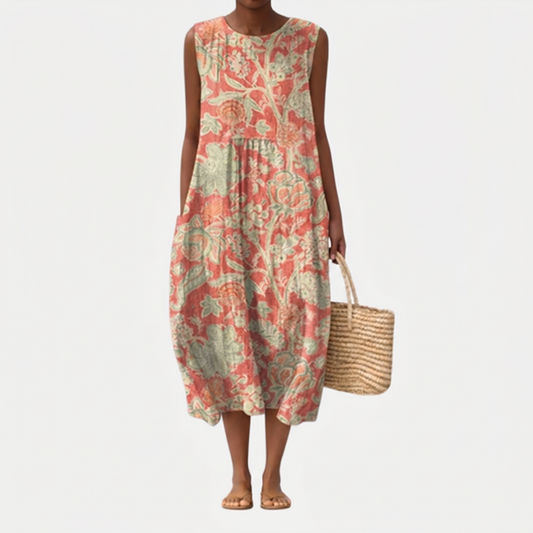 Vestido midi sin mangas estampado floral coral y verde, falda amplia, largo a media pierna